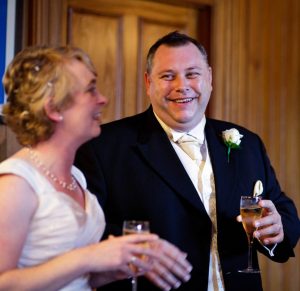 Bride and Groom having champagne toast after ceremony